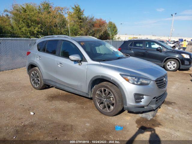 Salvage Mazda Cx